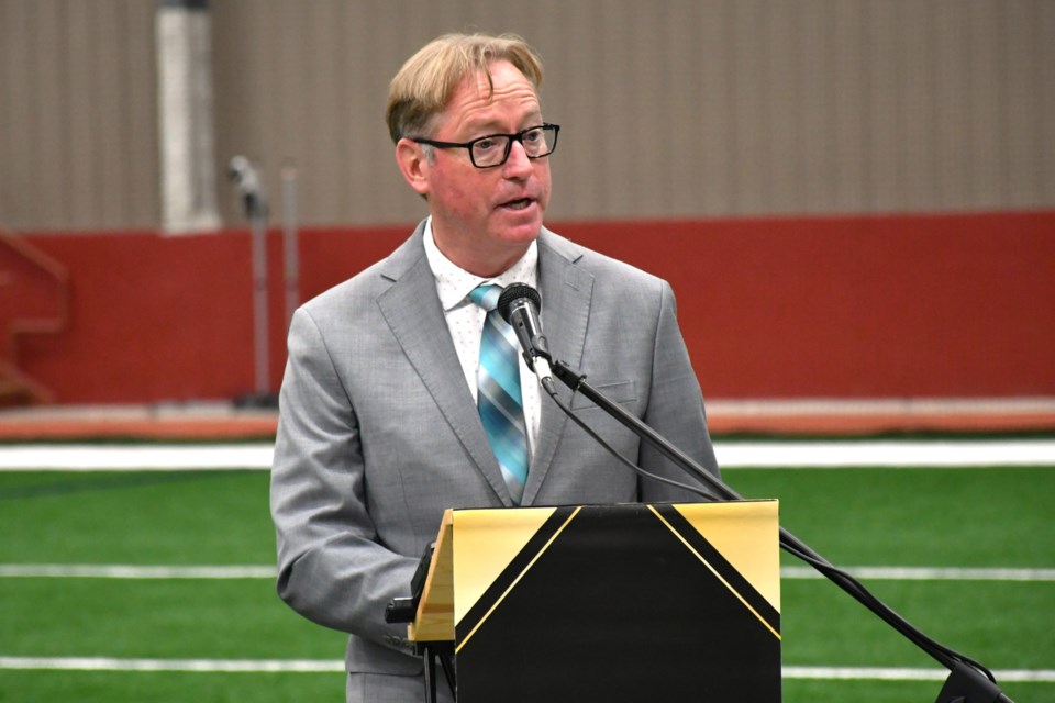 Mayor James Murdock speaks at the Yara Centre during a provincial announcement about the Active Families Benefit.