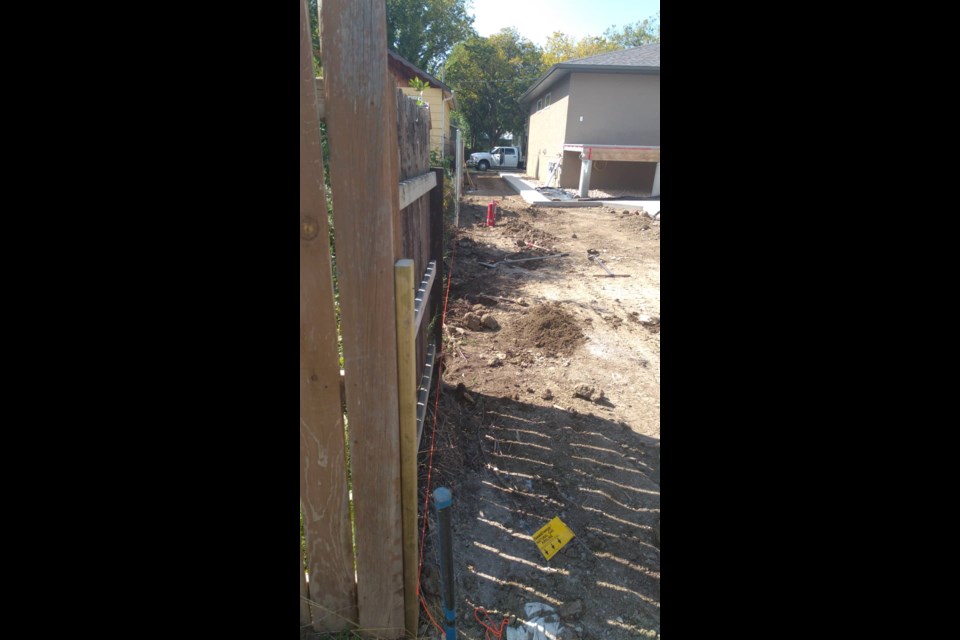 Contractors hit a natural gas line while installing a new fence on the 1100 block of Sixth Avenue Northwest on Sept. 4. Submitted photo