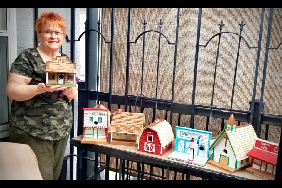 Leona Sterling was the lucky winner of the birdhouse village set.