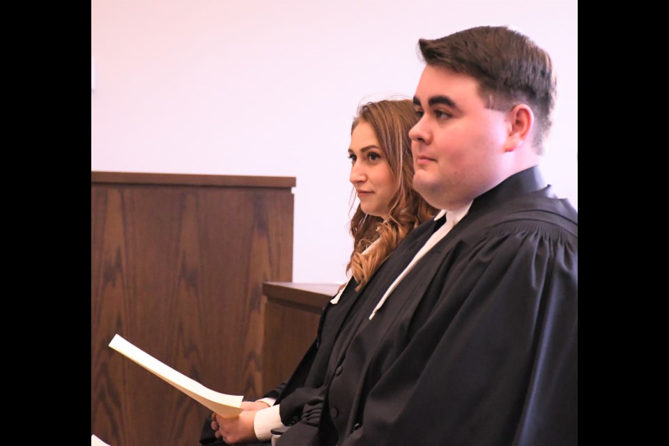 Darcy Dumont (foreground) and Chelsea Fielding participate in a Bar Admission Ceremony at the Court of Queen’s Bench on Nov. 1 that officially welcomed them to the law profession. Photo by Jason G. Antonio