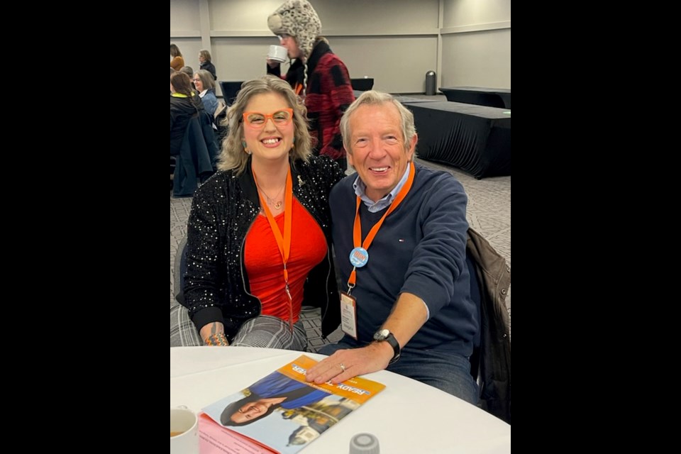 Cheantelle Fisher (left) is seated next to premier Lorne Calvert (right) at the provincial NDP convention in Oct. 2023.