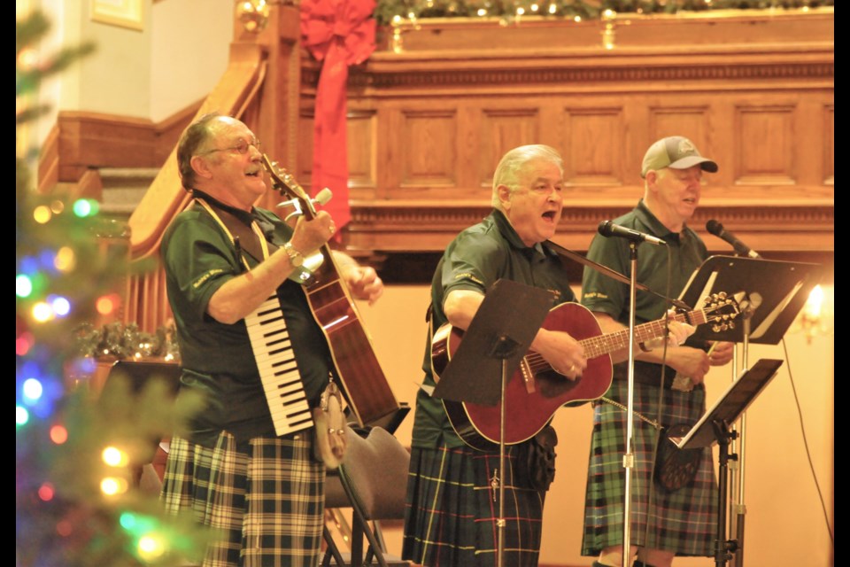 Desperate for Haggis performs "Christmas Comes But Once A Year" at the Rotary Carol Festival at Zion United Church. (Matthew Gourlie)