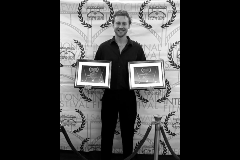 Filmmaker Jett Kowalchuk accepts an award for his short film, “John’s First Tattoo,” at the Saskatchewan International Film Festival.