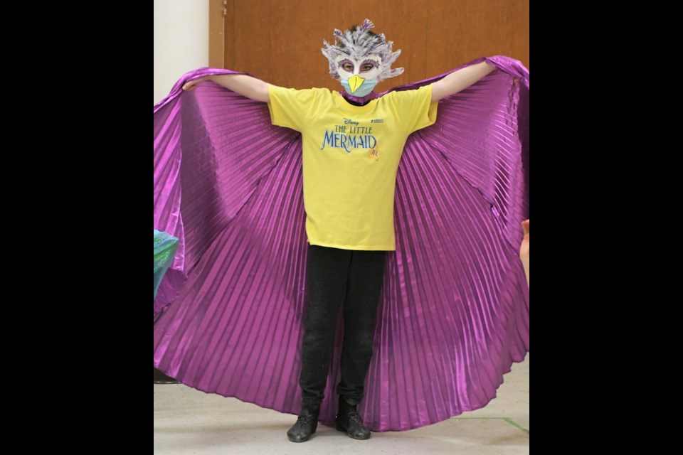 A bird stretches its wings while rehearsing  'The Little Mermaid Jr.' Photo by Jason G. Antonio 
