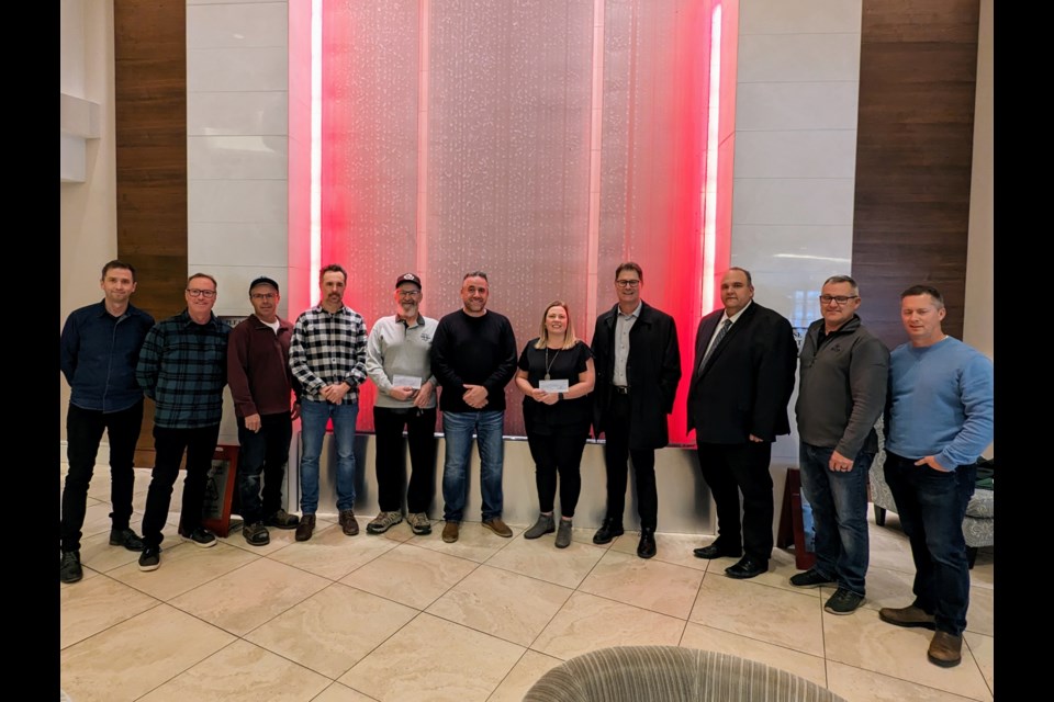 The River Street Promotions board and Homestand committee with representatives from local school boards; (l-r) Jared Mathieson, James Murdock, Kenric Phillips, Shea Jameson, Charlie Meacher, John Iatridis, Amanda Olson, Ryan Boughen, Ward Strueby, Jamie Logan, and Chris Olfort