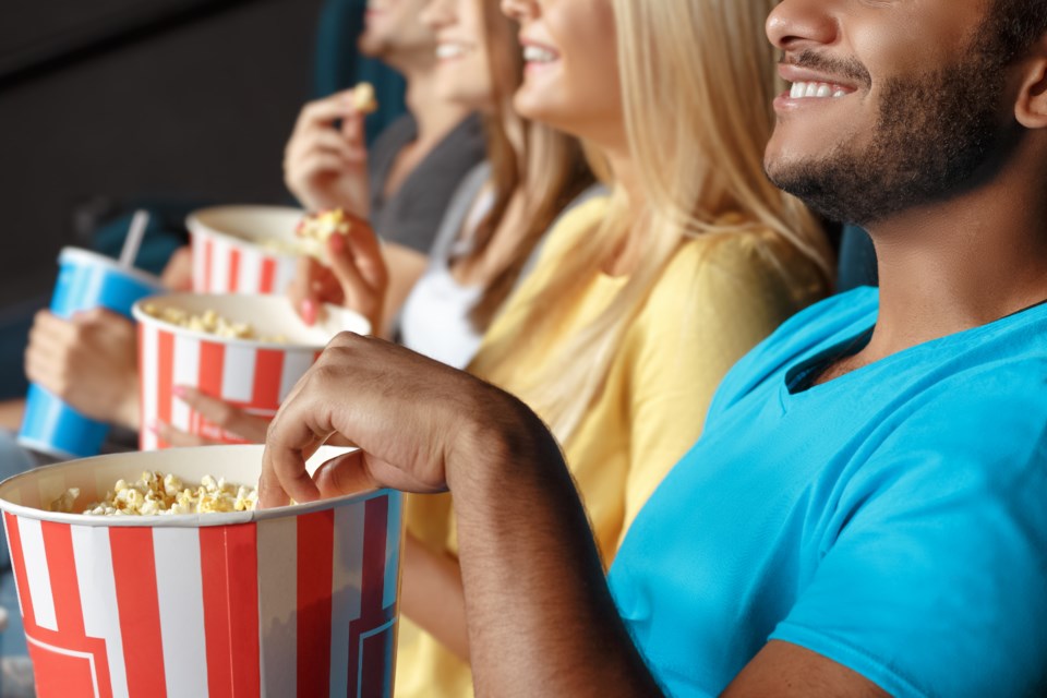 watching movie in theatre shutterstock