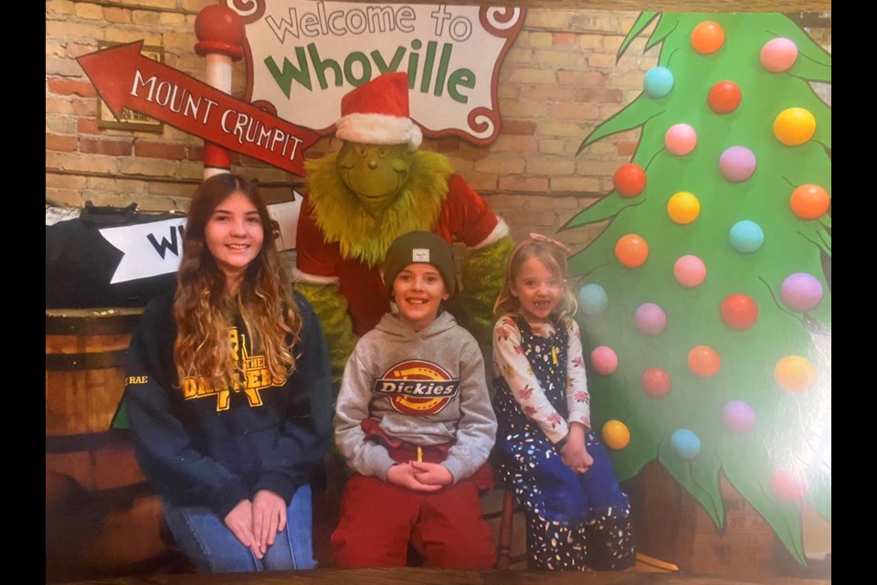 One of the pictures taken this holiday season with the Grinch at Past Times.