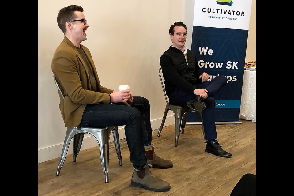 Jordan McFarlen, left, business incubator manager with Cultivator, laughs while Joel Pinel, owner of WOW Factor Media speaks during the Cultivate SK Roadshow. (Matthew Gourlie photograph)