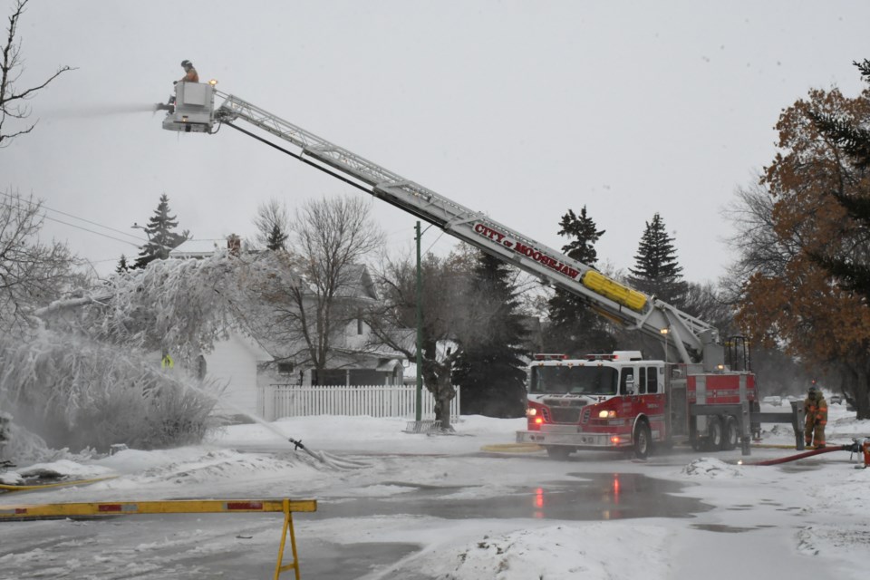 The fire department sent two trucks to fight a fire at an apartment at 277 Athabasca Street West. Photo by Jason G. Antonio