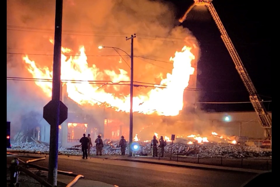 Scenes from the massive fire that destroyed the building at 125 Third Ave NW on Saturday night.
