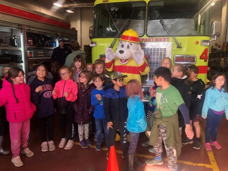 kids-take-a-picture-with-sparky-courtesy-janice-colven