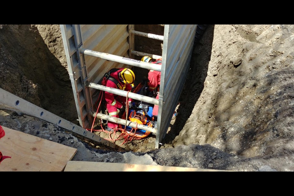 Firefighters practise extricating a public works employee from a trench during a mock exercise on Normandy Drive. Photo courtesy City of Moose Jaw 