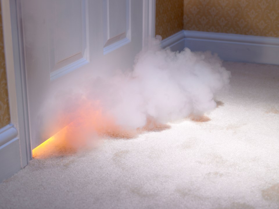 Smoke coming in under door (Michael Blann-DIgitalVision-Getty Images)