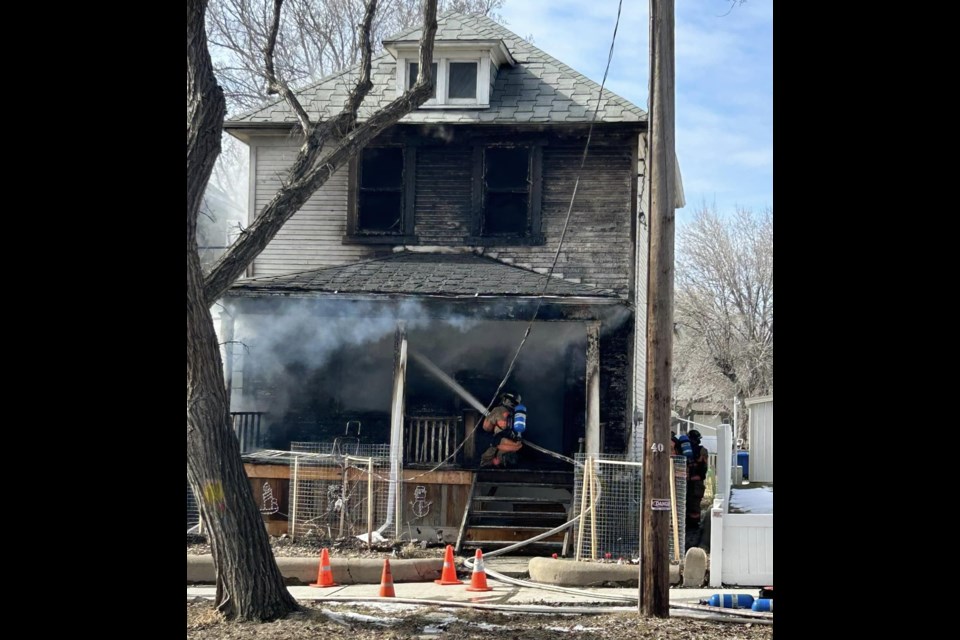 A picture of the Willow Street residence taken from a passer-by as fire crews battle the final stages of the fire.