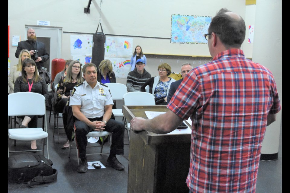 Mayor Fraser Tolmie gives his support to a new project to improve the health of youths, during the program's launch on May 8 at the YMCA Fairford Street location. Photo by Jason G. Antonio