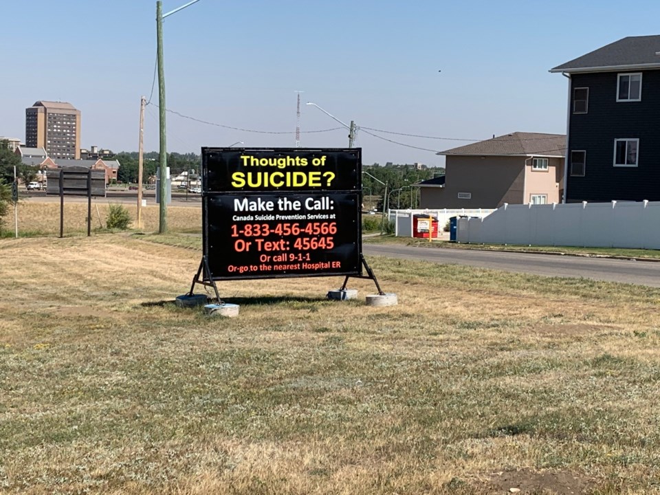 suicide prevention billboard main st s
