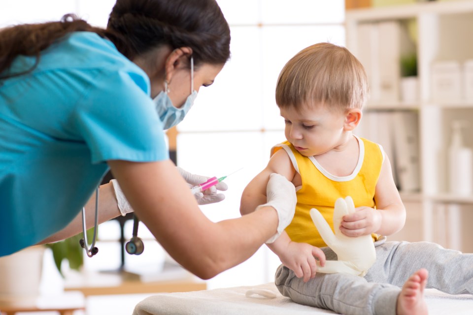 vaccinating child stock photo