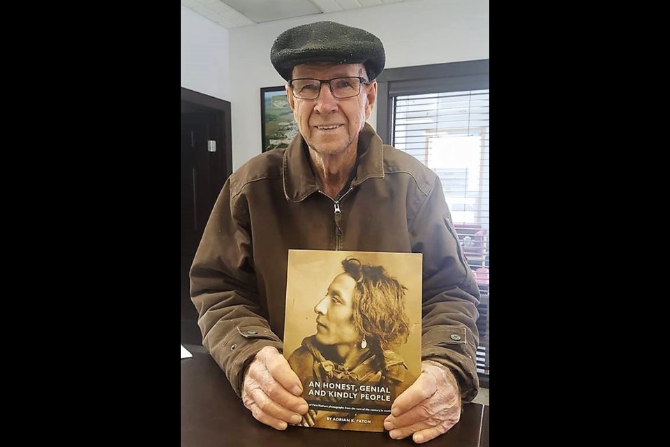 : Adrian K. Paton with a copy of his book An Honest, Genial and Kindly People. (submitted photograph)
