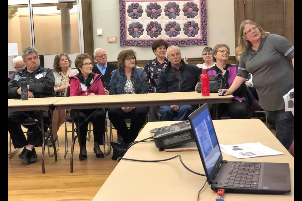 Susan Gardner, right, from the Saskatchewan Genealogical Society hosted a virtual tour of the Moose Jaw Cemetery to a large crowd at the Moose Jaw Public Library. (Matthew Gourlie photograph)
