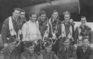 Group Photo – Air Crew, No. 426 Thunderbird Squadron (On Wings of Fire), 7th Bomber Squadron, in front of Lancaster Mark II aircraft, #DS 846, “Old Black Magic.” Harold Hurley, age 33 and crew were killed in action Dec. 16, 1943. Other member of the crew were: Pilot Officer Lewis Percival Archibald, Pilot Officer Norman Byng Morrison, Warrant Officer Class II Jack Dunbar Newcombe, Pilot Officer Robert Philip Marks (Royal Air Force Volunteer Reserve), Sergeant Raymond Atkin (Royal Air Force Volunteer Reserve) . Photo courtesy Veterans Affairs Canada