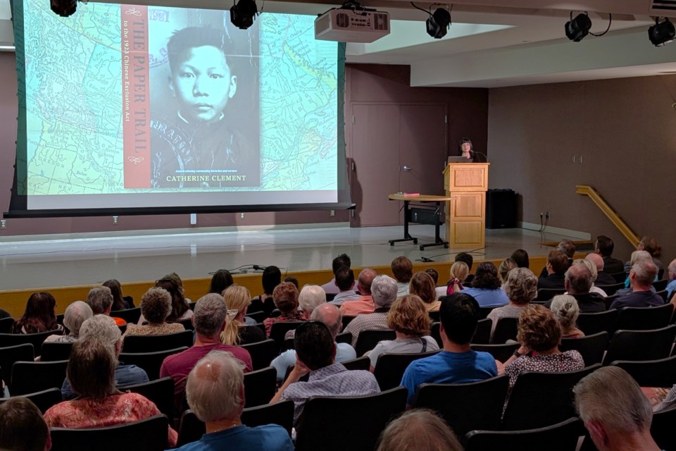 Author Catherine Clement delivers her presentation to a full audience at the Moose Jaw Museum and Art Gallery theatre recently.