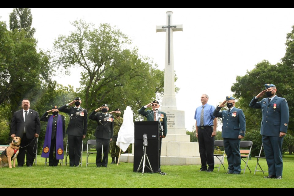 Military personnel, veterans, and dignitaries stand for O Canada. Photo by Jason G. Antonio 