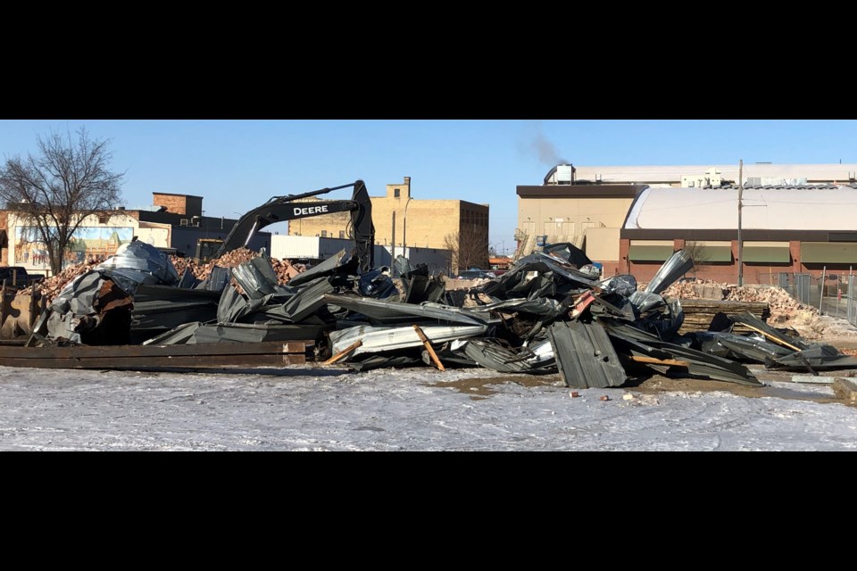 Demolition of the historic Merchant Block building. Photo by Jason G. Antonio