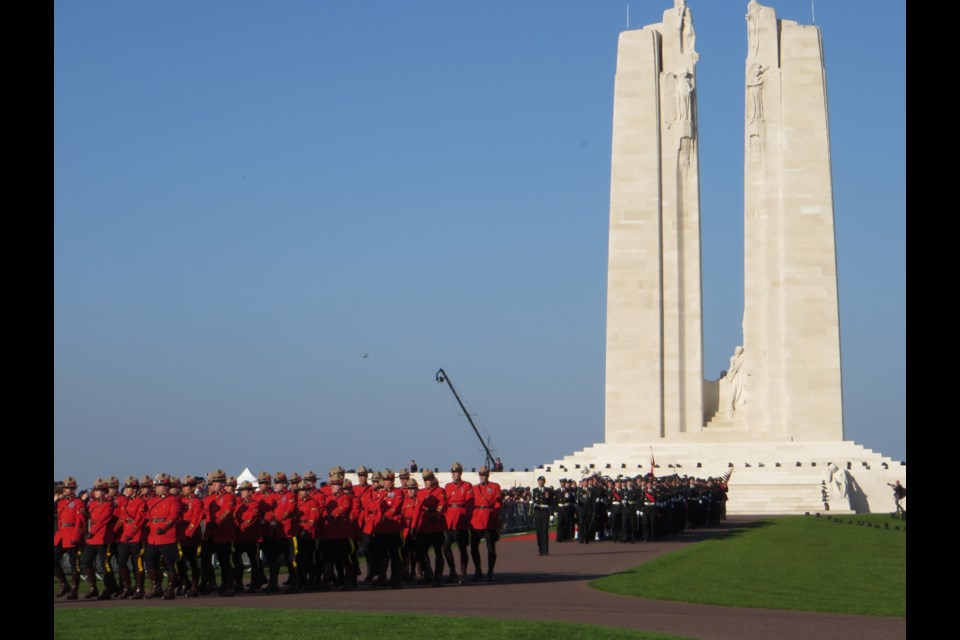 RCMP and members of Canada’s military march past the Vimy Ridge monument on April 9, 2017 at the conclusion of an event commemorating the 100th anniversary of the battle, which lasted from April 9 to 12, 1917. Photo by Jason G. Antonio