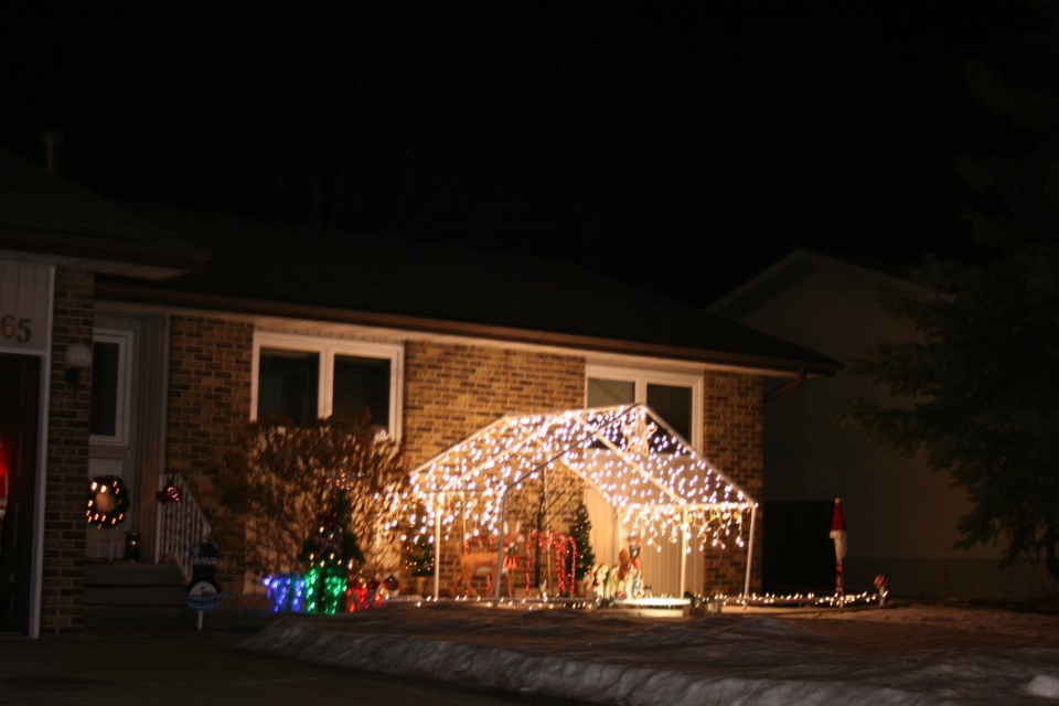The winners of last year’s (2020) Knights of Columbus “Keep Christ in Christmas” lighting contest. First Place.