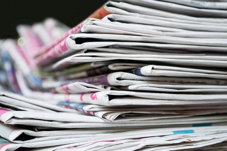 stack of old newspapers getty images