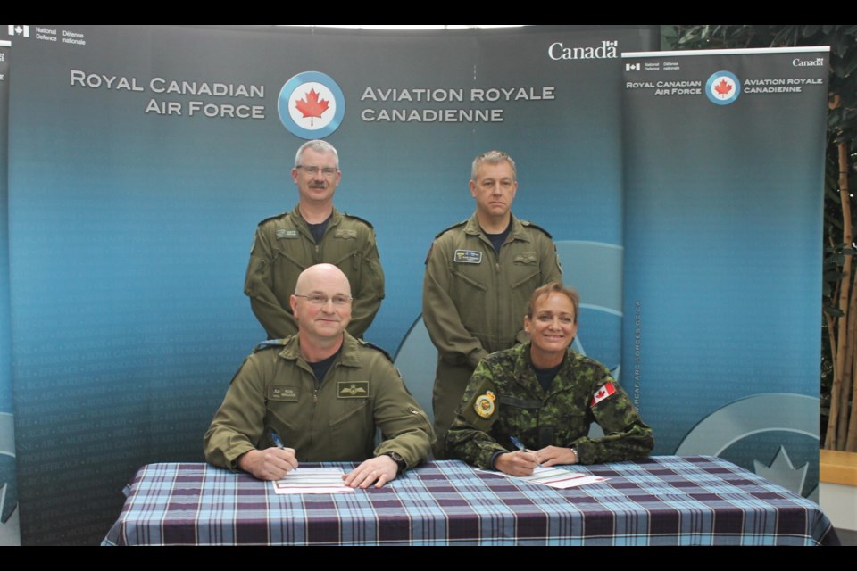 (Back): Lt.-Col. Kevin Tipper and Lt.-Col. Blair Springate, with (front) Wing Commander Col. Ron Walker and Chief Warrant Officer Marlene Shillingford marking the official start of 15 Wing’s annual charity fundraiser.