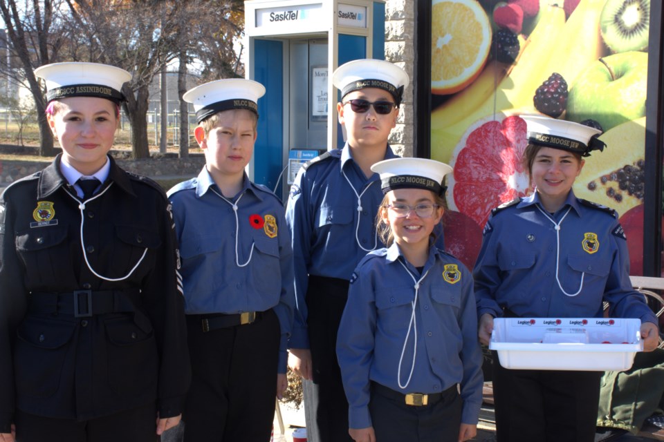 Volunteers with the 99 Royal Canadian Sea Cadet Corps Assiniboine and the 33 Moose Jaw Navy League helped kickstart this year’s Poppy Campaign at 鶹Ƶ Hill Fine Foods on Oct. 26.