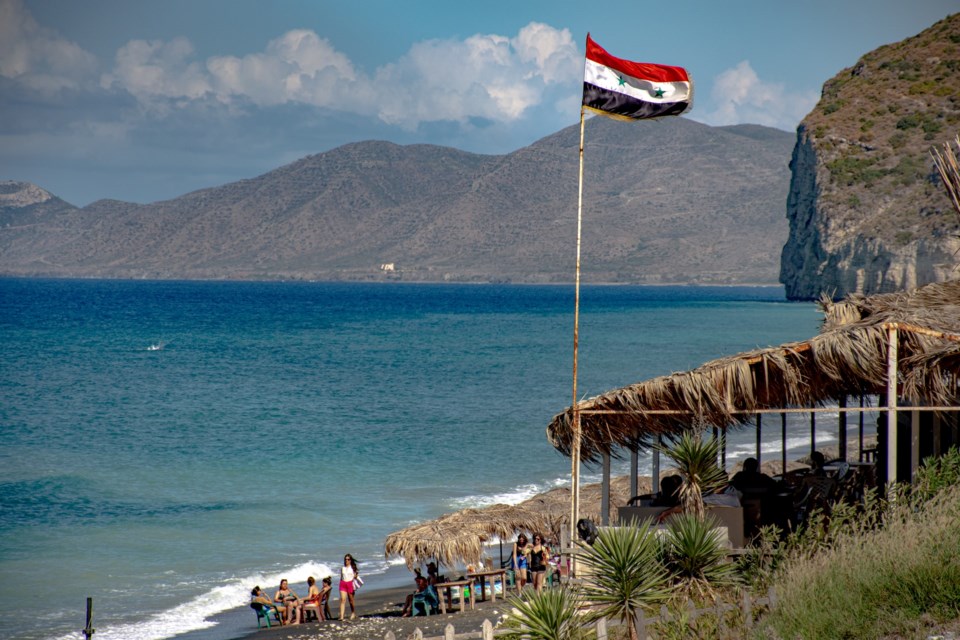 Syrian coast with Syrian flag flying
