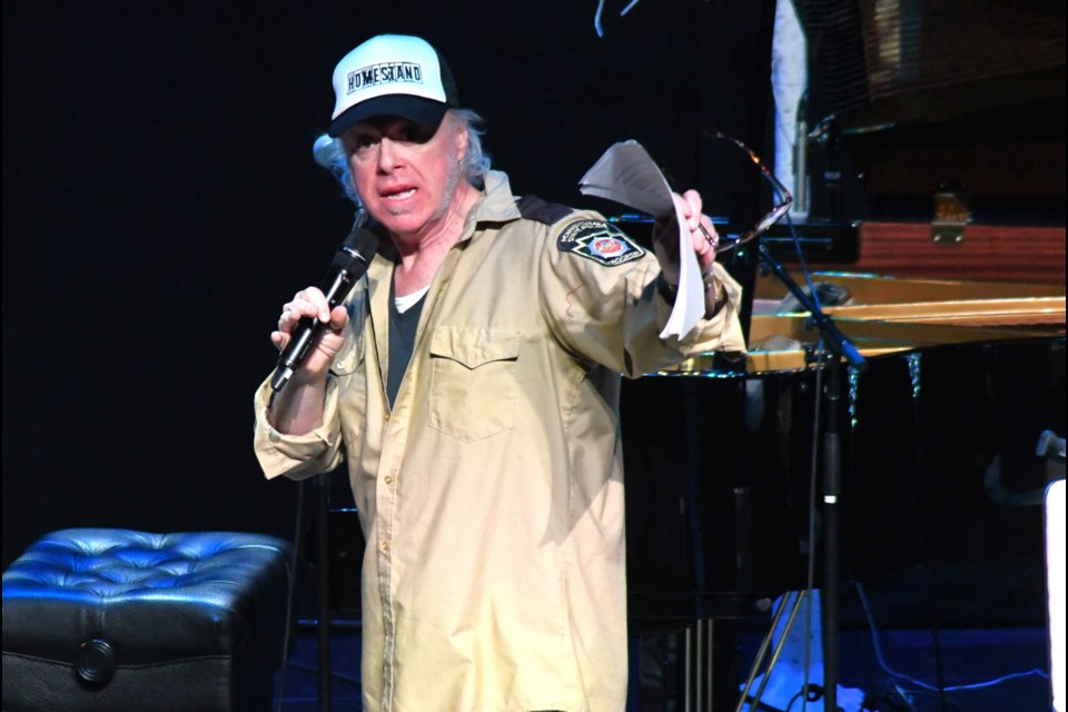 Returning host Joel Stewart introduces the night’s performers at the start of “A Night in Nashville” on Dec. 14.