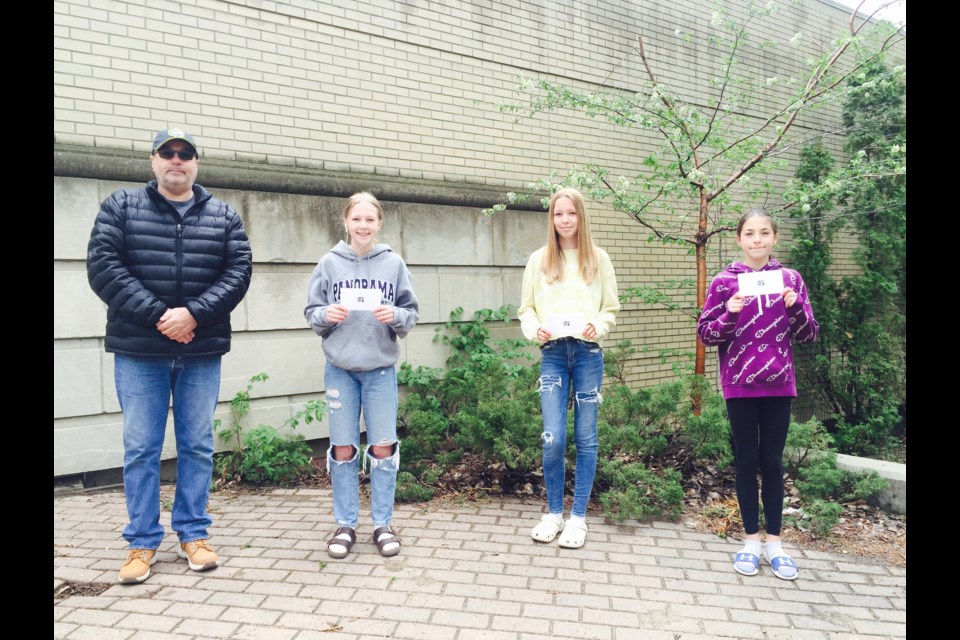 (l-r) Mark Gilliland; Scout Panko, fist place locally and nationally; Ellie Panko, second place locally; and Kensington Demassi, third place locally. 