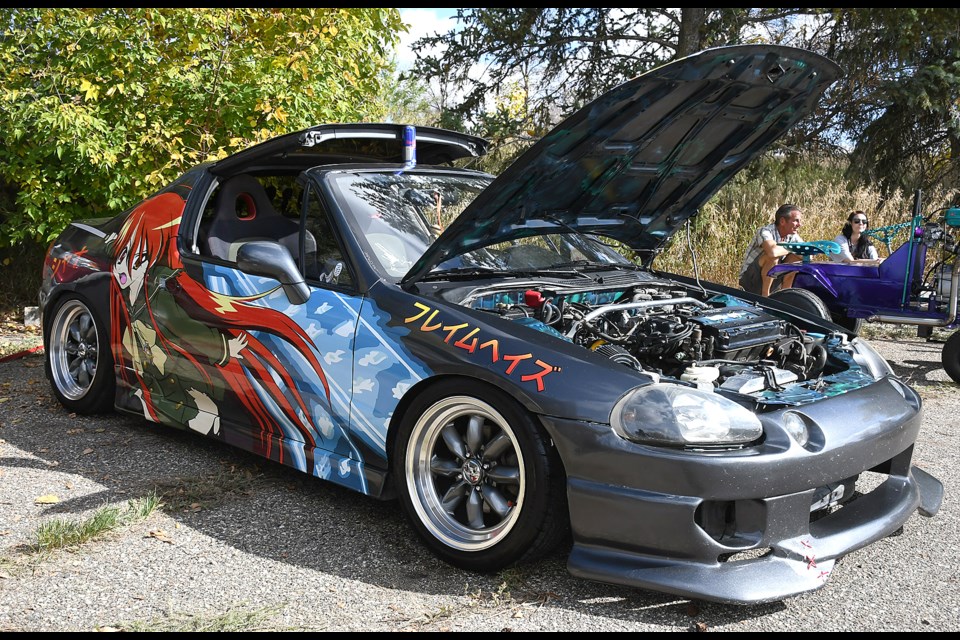Some of the cars on display took their style to another level, like this anime-themed racer.