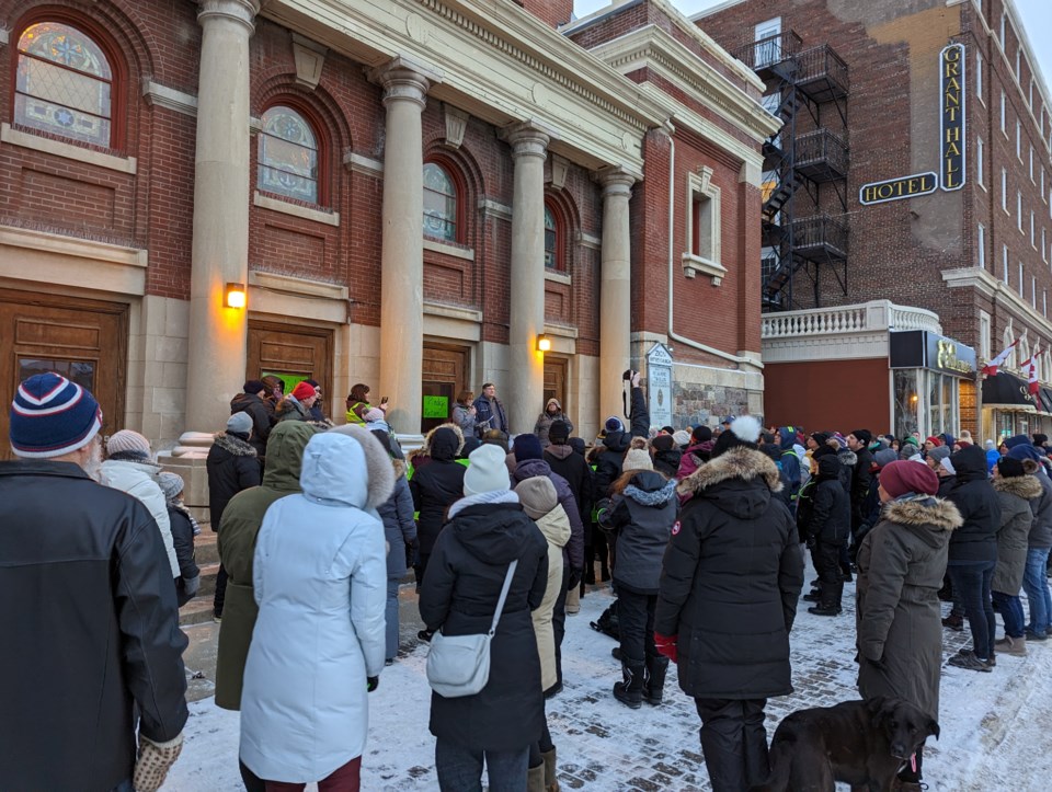 5-walkers-gather-on-the-steps-of-zion-united-church-to-listen-to-square-one-chair-della-ferguson-start-the-event-off