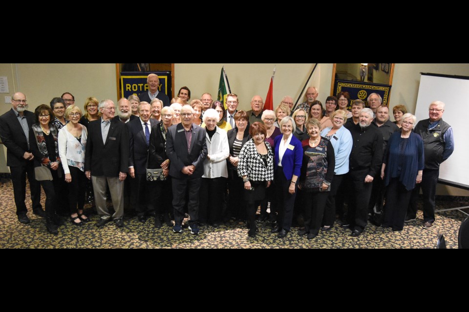 Members of the Moose Jaw Wakamow Rotary Club past and present gather for a group photo after their 35th anniversary celebration.