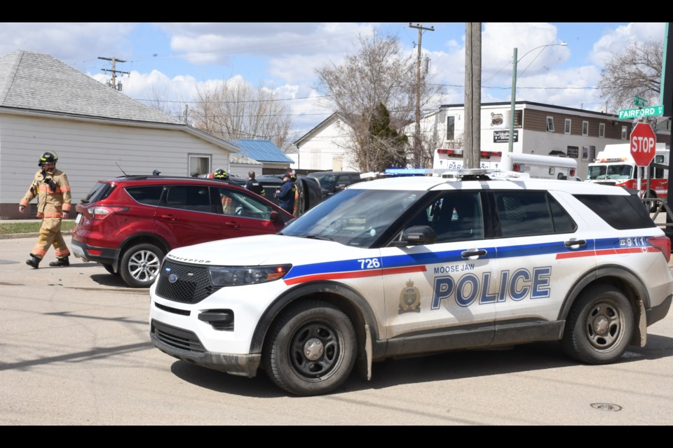 A police cruiser blocks the intersection of Fifth Avenue West and Fairford Street West after a collision occurred there. Photo by Jason G. Antonio