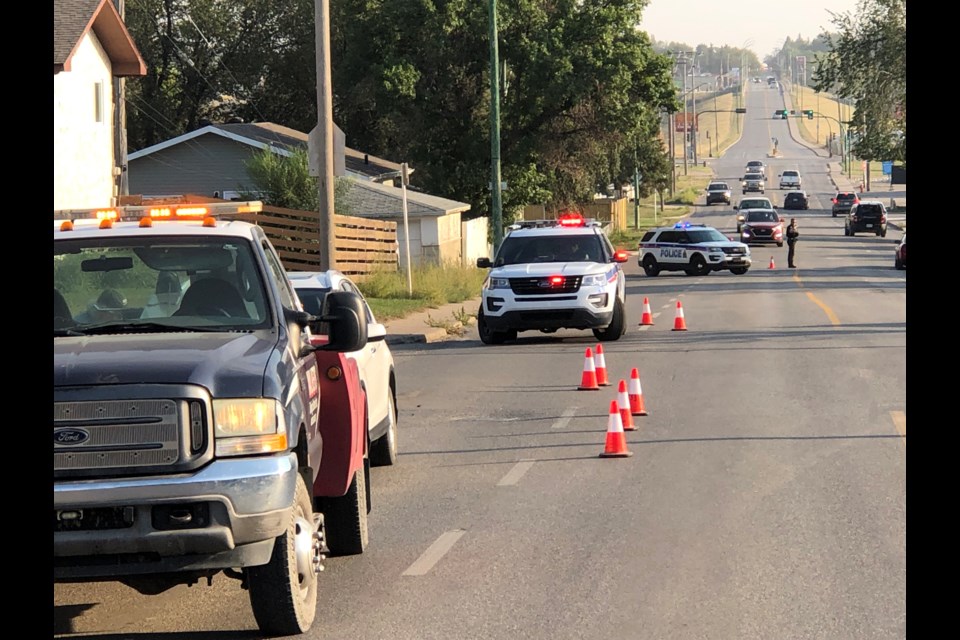 Moose Jaw police re-directed traffic and closed the northbound lane on Ninth Avenue Northwest after a collision near the Athabasca Street intersection, on Sept. 7. Photo by Jason G. Antonio