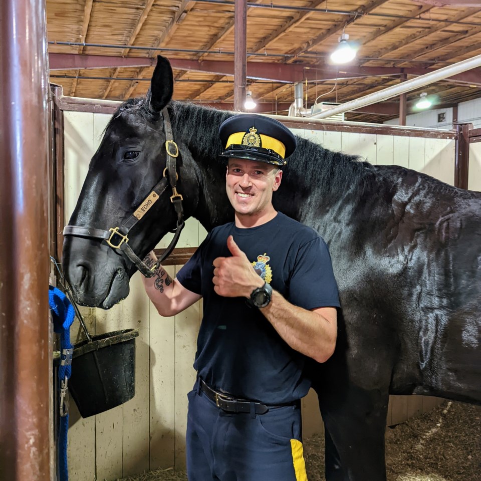 Constable Chris Russell with Echo