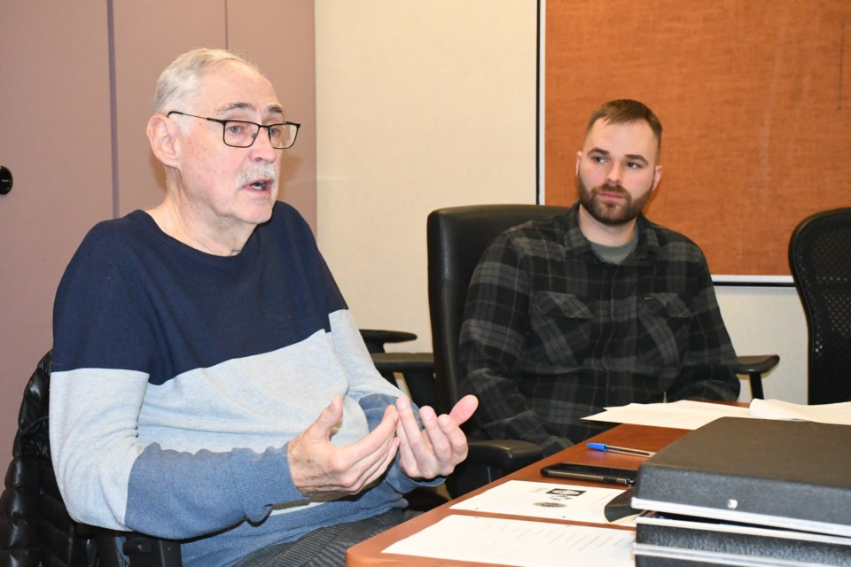 Lyle Johnson, chairman of Moose Jaw Crime Stoppers, gives his report during the group's annual meeting on Feb. 7. To his left is Const. Brandon Hoggins, the board's police liaison. Photo by Jason G. Antonio 