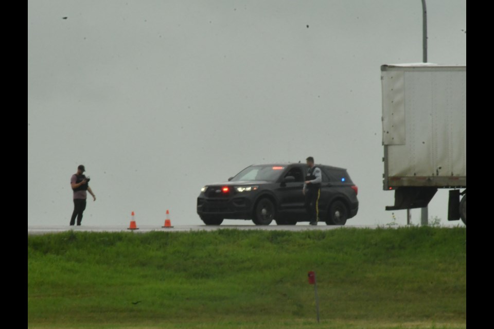 Officers with the Moose Jaw Police Service conduct an operation on Highway 1 near the intersection of 32nd Avenue Northwest. Photo by Jason G. Antonio 