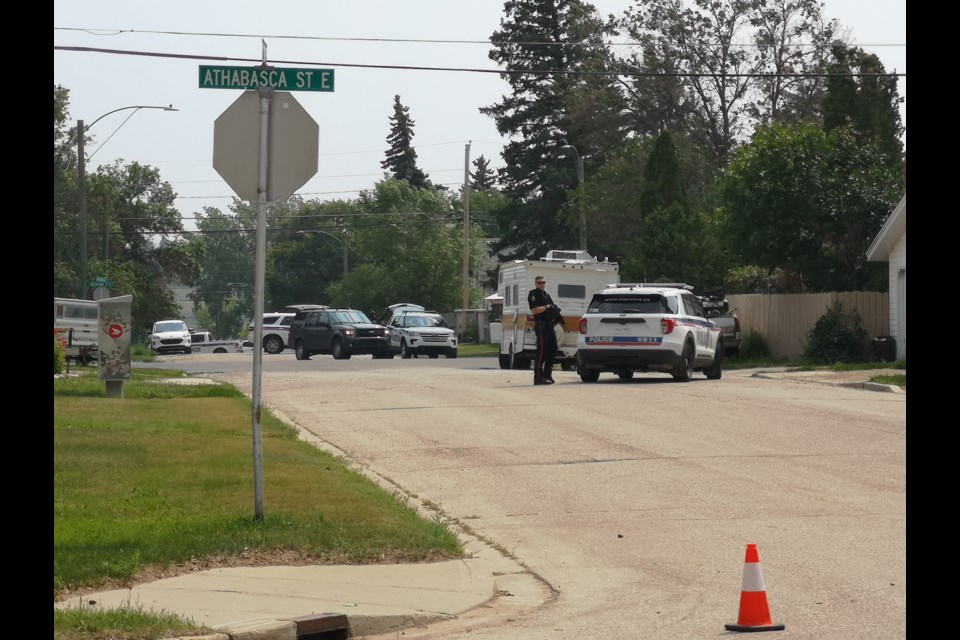 Police are conducting an ongoing operation at the intersection of 8th. Ave. N.E. and Stadacona St. E. 