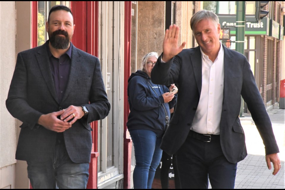 Chey Craik, the People's Party of Canada candidate for the Moose Jaw-Lake Centre-Lanigan constituency, and PPC leader Maxime Bernier make their way toward the Mae Wilson Theatre for a rally. Photo by Jason G. Antonio