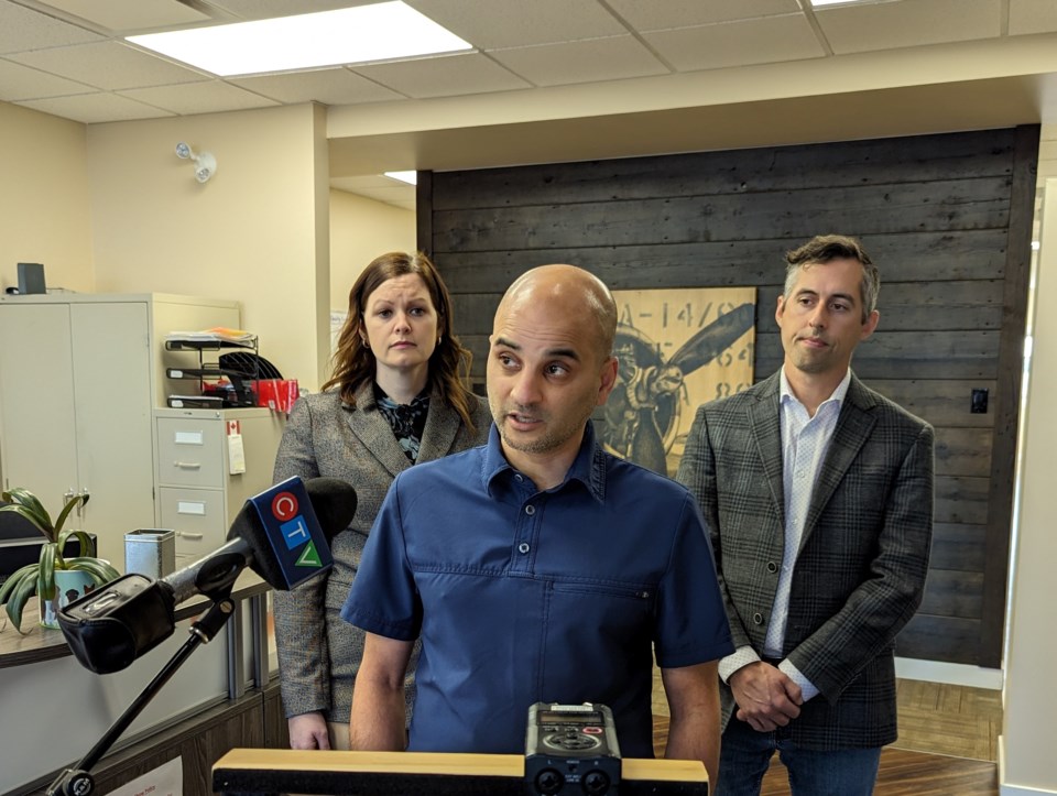 dr-ata-stationwala-a-moose-jaw-podiatrist-appeals-for-a-meeting-with-tim-mcleod-stationwala-is-flanked-by-ndp-health-critics-vicki-mowat-and-jared-clarke