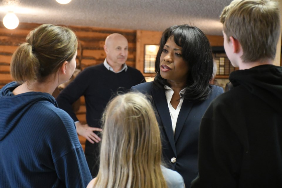 Leslyn Lewis, an Ontario MP attempting to become the next leader of the Conservative Party (second from right), speaks with the Reich family during a stop in Moose Jaw. Photo by Jason G. Antonio 