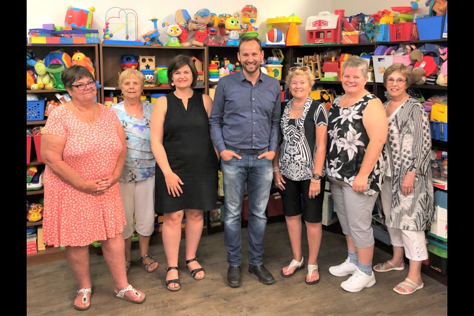 Sask. NDP leader Ryan Meili (middle) meets with staff and volunteers at the South East Early Childhood Intervention Program in Moose Jaw during a tour of the building. Photo courtesy Ryan Meili 