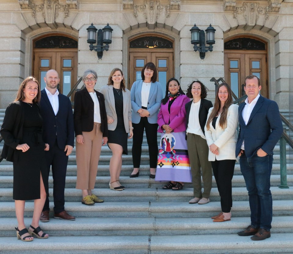 NDP MLAs on the legislature steps after Beck's election