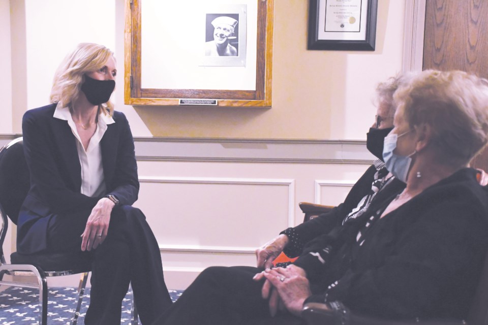 Kathryn Pollack (left) visits with Darleen Smith and Pat Olynik during a meet-and-greet event at the cultural centre on June 9. Photo by Jason G. Antonio 